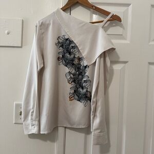 Chic Asymmetrical White Blouse with Floral Accent
